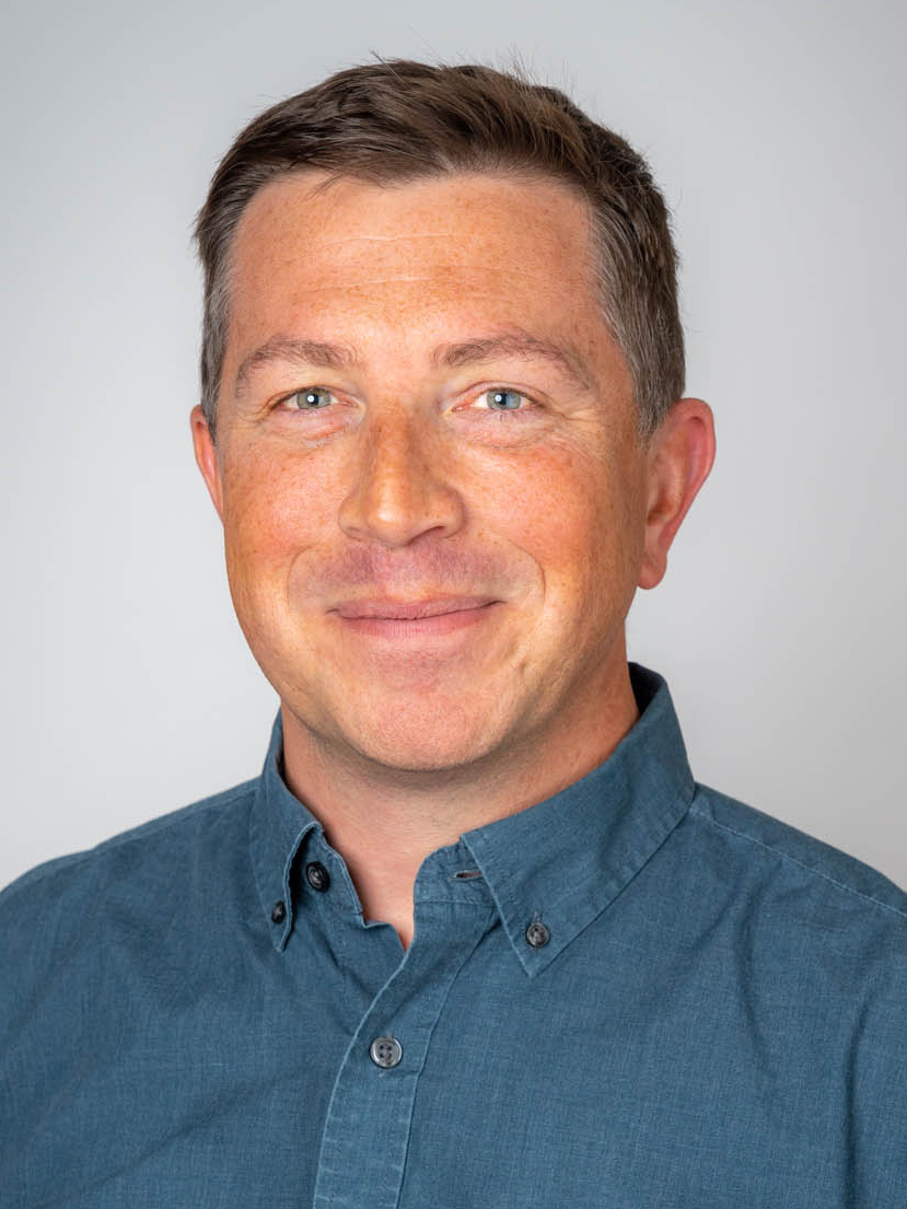 chris jones photo photo of a man in blue shirt